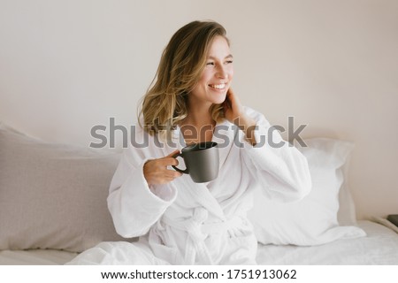 ストックフォト: Beautiful Woman Having Coffee And Fruits For Breakfast And Looks Into The Laptop Banner Long Format