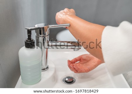 ストックフォト: Washing Hands Hygiene Step Closing Faucet Tap With Arm Instead Of Hand After Drying Hands For Covid