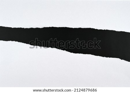 Foto stock: Top Of Paper Page Torn Off And Isolated On Black