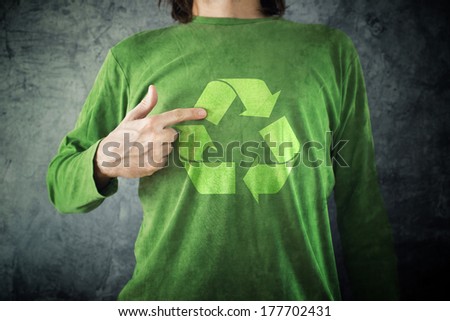 Stock foto: Recycle Man Pointing To Recycling Symbol Printed On His Shirt