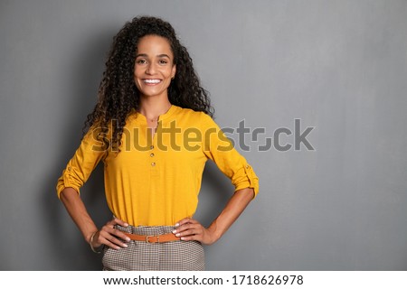 Stock photo: Beautiful African American Woman Womans Isolated On Grey Backgro