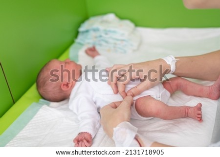 Stok fotoğraf: Newborn And Mum Hospital Bracelets