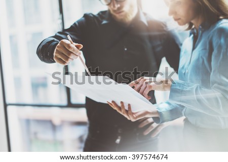 Stok fotoğraf: Managers Working With Papers