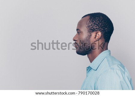 [[stock_photo]]: Side View Of Casual Dressed Handsome African American Male Executive Sitting On Couch And Using Digi