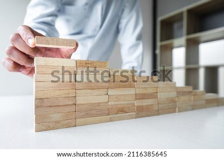 Risk To Make Business Growth Concept With Wooden Blocks Hand Of Stock foto © Freedomz