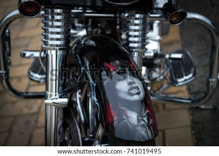 Stok fotoğraf: Man With Airbrush Spray Paint With Car Boat And Motorcycle Drawing On Dark Background