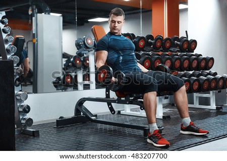 Zdjęcia stock: Closeup Of Young Handsome Man Doing Exercises On A Bench Press