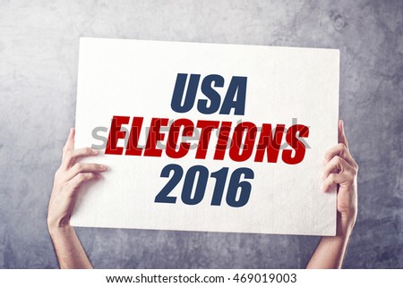 Imagine de stoc: Usa Elections 2016 Man Holding Poster