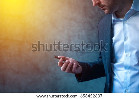 Stock foto: Businessman In Hurry Received Sms Message On Smartphone