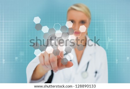 Stock photo: Blonde Doctor Using Touchscreen Displaying Chemical Formula