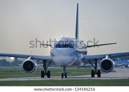 Foto stock: Airplane On The Runway Wating For Take Off