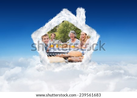 Сток-фото: Composite Image Of Laughing Family Having A Barbecue In The Park