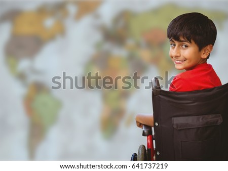 Foto stock: Boy In Wheelchair Against Blurry Map