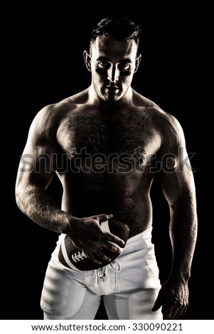 ストックフォト: Composite Image Of Shirtless American Football Player With Ball