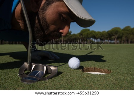 Golf Player Blowing The Ball Foto stock © dotshock