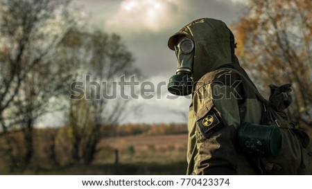 Stock photo: Soldier In Gas Mask