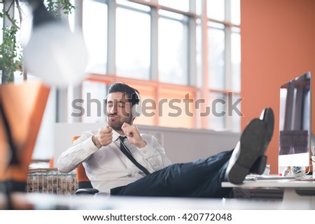 Arab Businessman Playing Drum On Desk [[stock_photo]] © dotshock