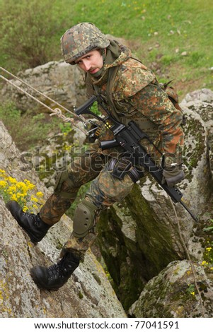 [[stock_photo]]: Armed Man With A Gun