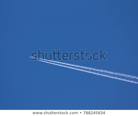 Stock photo: Wing Of Aircraft On A Background Of Clear Blue Sky