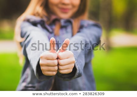 Сток-фото: Kid Giving Thumbs Up Sign Smiling