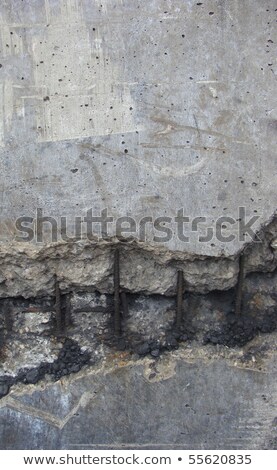 Stock photo: Damaged Worn Dirty Fortified Concrete With Rusty Metal Showing