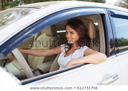 Foto stock: Young Woman Enjoying A Car Ride