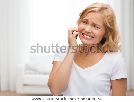 Stock fotó: Unhappy Woman Suffering From Face Inch