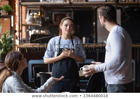 Foto stock: Indignant Waitress