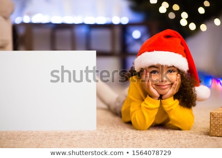 [[stock_photo]]: African Santa Girl With Copy Space Poster