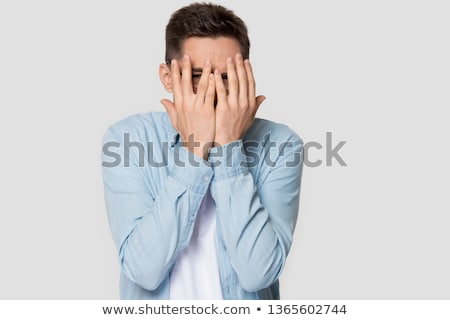 Zdjęcia stock: Ashamed Man Covering Face