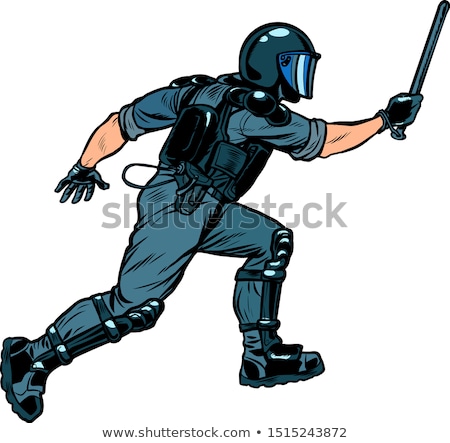 [[stock_photo]]: Riot Policeman Attacks With A Baton Police Work Authoritarian And Totalitarian Regimes Concept