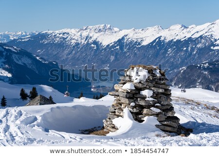 Stockfoto: Stack Of Stones On Highlands Mountain And Sky