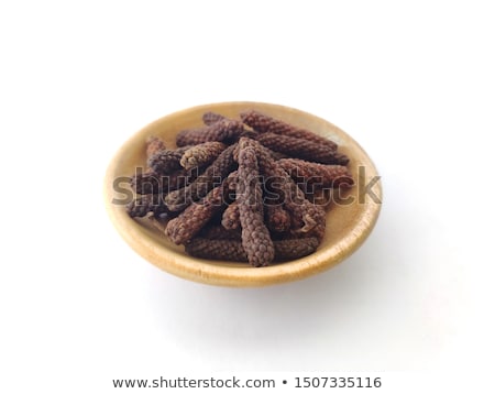 Foto stock: Front View Of Bowl Of Organic Long Pepper