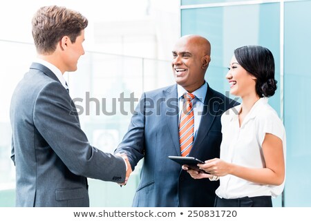 Businesswomen Having Work Meeting In Front Of Skyline Foto stock © Kzenon