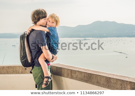 Stock fotó: Dad And Son In The Background Of Tropical Beach Landscape Panorama Beautiful Turquoise Ocean Waives