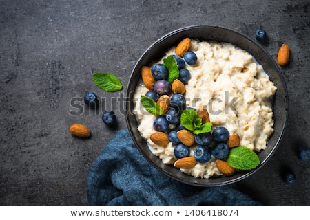 Foto stock: Black Bowl With Natural Organic Granola Cereal