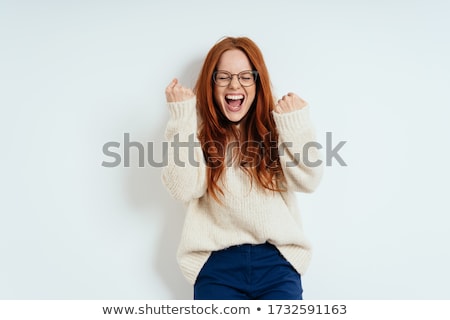 Stock fotó: Victorious Exultant Young Woman Cheering