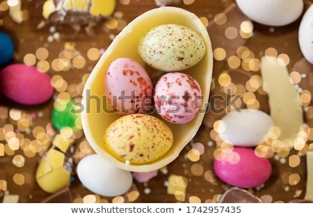 Stock photo: Chocolate Eggs And Candy Drops On Wooden Table