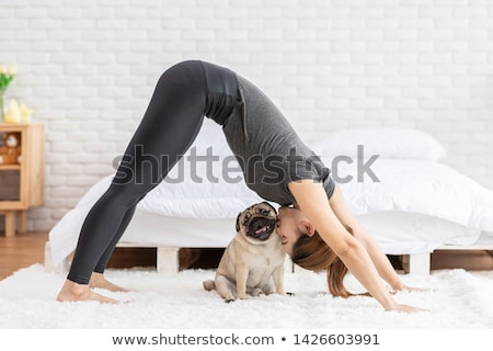 Stock photo: Portrait Of Young Woman With Puppy