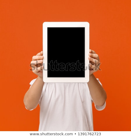 Stock photo: Hide The Face Behind Digital Tablet