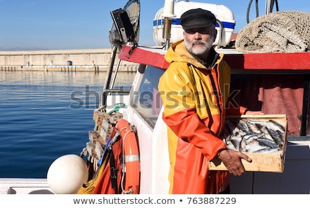 Stock photo: Fisherman And The Sea