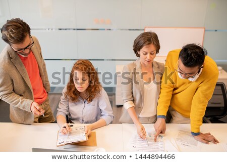 Stock foto: Group Of Thoughtful Concentrated Young Multi Ethnic Business Analysts