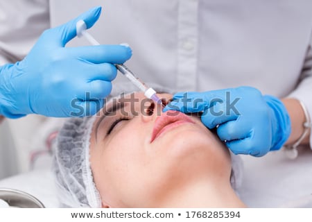 Foto stock: Hyaluronic Acid Lips Injection