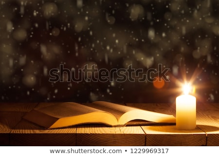 Stockfoto: Bible And Christmas Candle