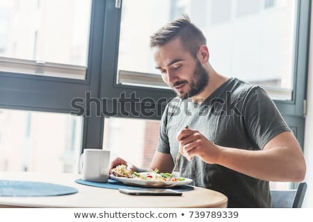 ストックフォト: Man Eating