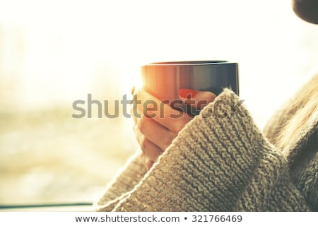 Stock fotó: Woman Holding Hot Cup Of Tea