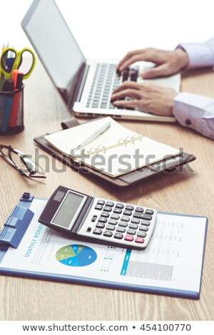 Stockfoto: Man Calculating Acount