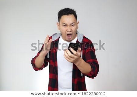 Foto stock: Attractive Man Gesturing Trouble And Anger