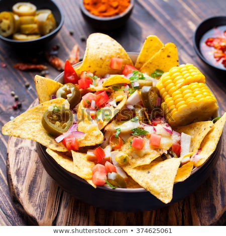 Stok fotoğraf: Nachos Cheese Sauce Salsa And Corn Cobs Top View