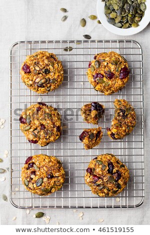 ストックフォト: Oat Cookies With Cranberries And Maple Glaze On A Colling Rack